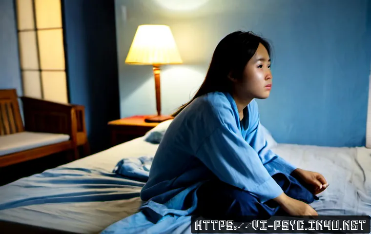 Home 17 조울증 초기 증상 - Photorealistic Vietnamese young adult sitting awake on the edge of a bed before sunrise, tired eyes ...